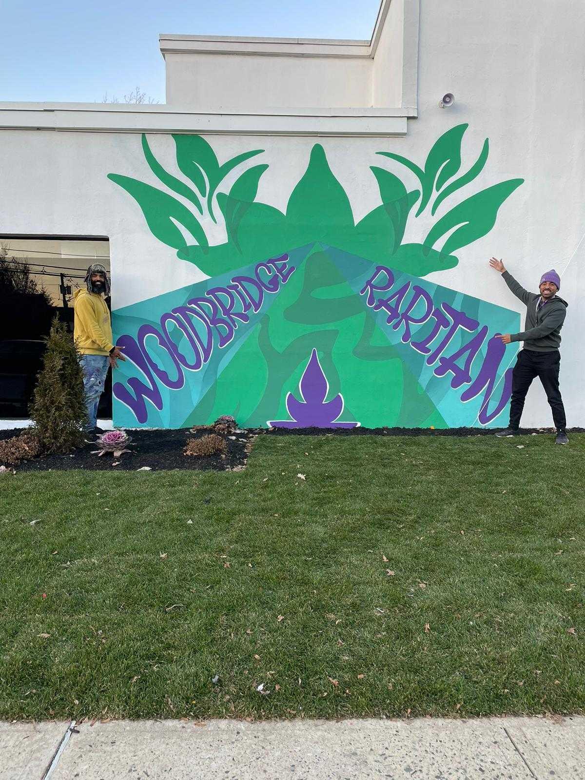 ANJA mural in Highland Park painting Woodbridge Avenue and Raritan Avenue meeting to form the ANJA A